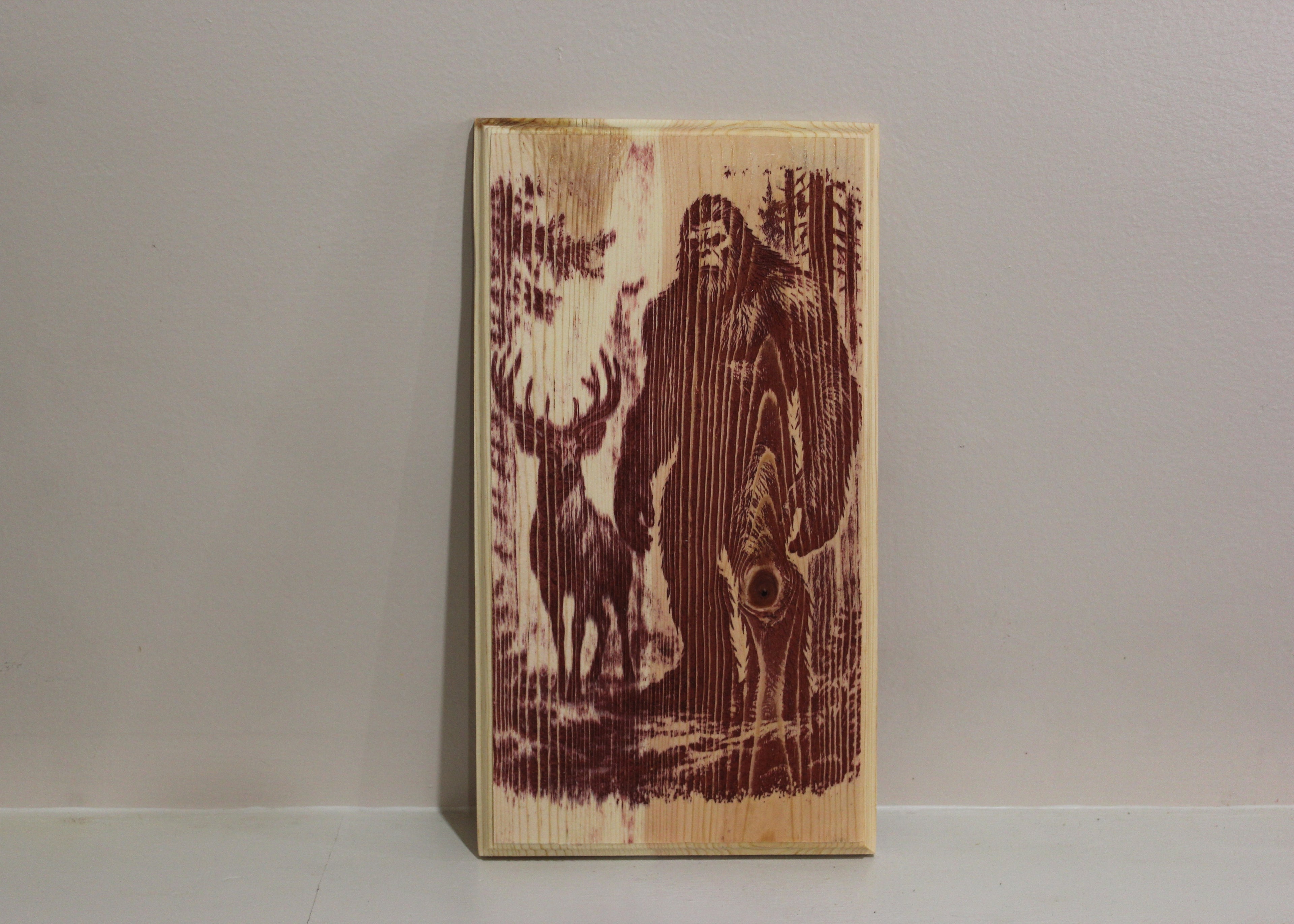 Bigfoot deer woods sign 7x13