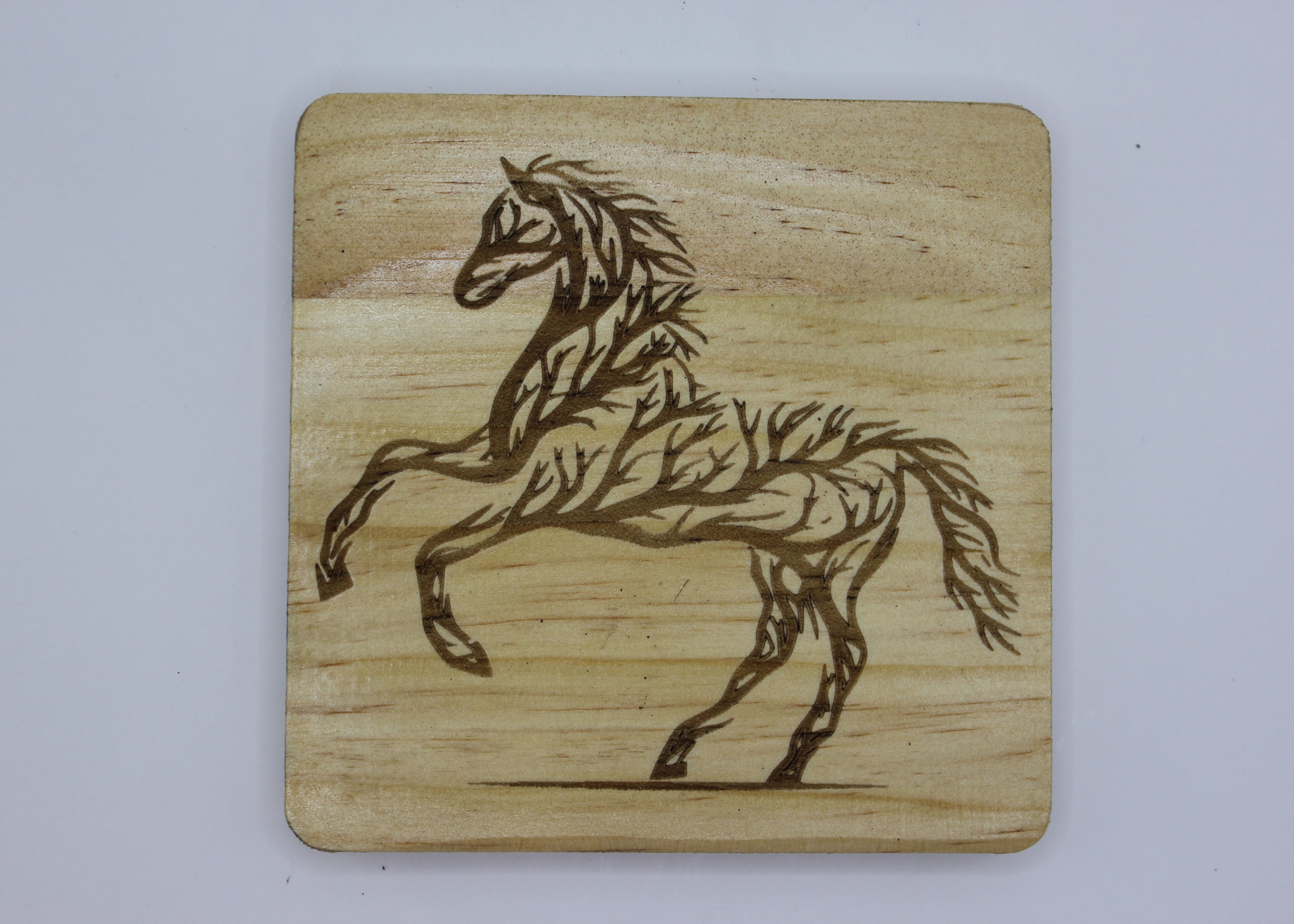 wood coaster tree horse